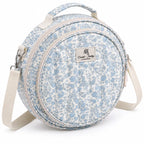 45-degree view of ZINGCRATER Blue Flower embroidery project bag showing the quilted floral exterior, front compartment and shoulder strap