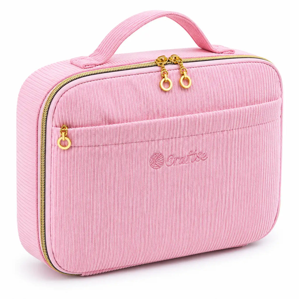 Angled view of ZINGCRATER pink corduroy crochet kit organizer case with front storage pocket, carry handle and gold zippers
