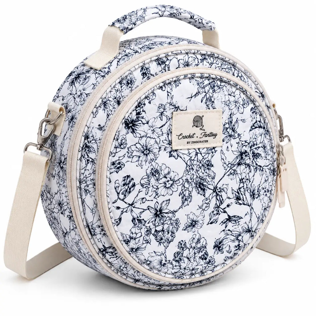 45-degree view of ZINGCRATER Garden Harvest embroidery project bag showing the quilted floral exterior, front compartment and shoulder strap