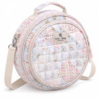 45-degree view of ZINGCRATER Patchwork embroidery project bag showing the quilted exterior, front compartment and shoulder strap